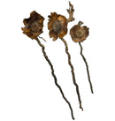 Three Coconut Petal Stem dried brownish-orange flower pins with twisted wooden stems