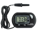 Black aquarium digital thermometer with coiled cable and probe showing 71.3°f for accurate water temperature monitoring