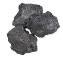 Black lava rock: dark gray porous volcanic pieces with rough uneven surface