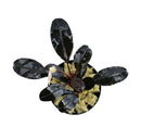 Bucephalandra entikong glossy black leafy plant with a pale pink flower in a round pot with yellow fibrous material