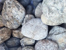 Elderly Boulder: rounded gray river stones with mottled textures