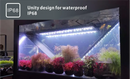 LEDSTAR AQ-X sleek transparent triangular aquarium with led lighting showcasing vibrant pink red green and brown plants