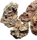 Irregularly shaped porous Maple Leaf Rock in red and brown tones