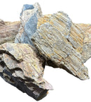 Moon Ring Rock: irregularly shaped layered fragments in beige, gray, blue tones