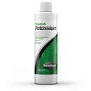 White plastic bottle with green and black seachem label for flourish potassium plant nutrient in planted aquariums