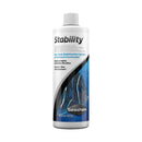 White plastic bottle of seachem stability aquarium bacterial supplement with blue and black fish label
